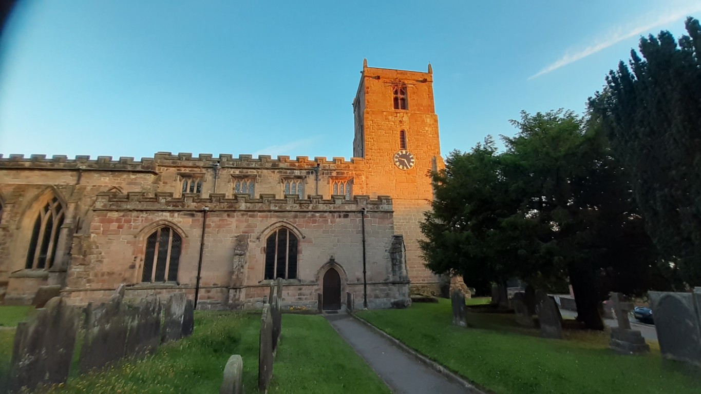 The north of the church, late on a summer evening